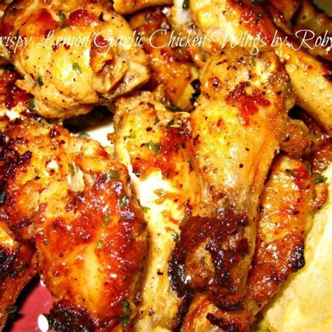 Now put the wings on the hot part of the grill and cook, uncovered, turning as necessary, until they're nicely browned on both sides. Crispy Lemon Garlic Chicken Wings~Robynne | Recipe ...