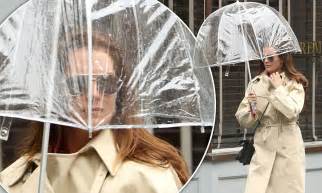 Brooke Shields Herself From The Rain With A See Through Umbrella
