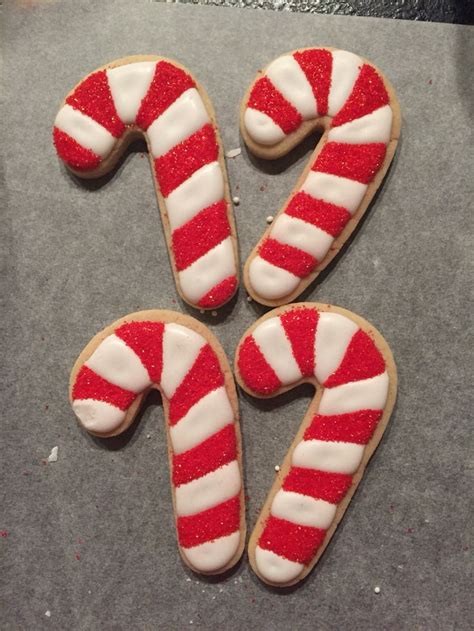 Candy Cane Cookies With Royal Icing And Sprinkles Christmas Cookies Decorated Christmas