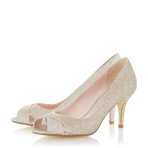 Untold Delamare Cross Over Peep Toe Court Shoes In Gold Lyst