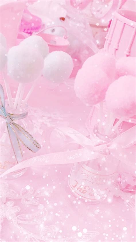 Pink And White Decorations With Bows On Them