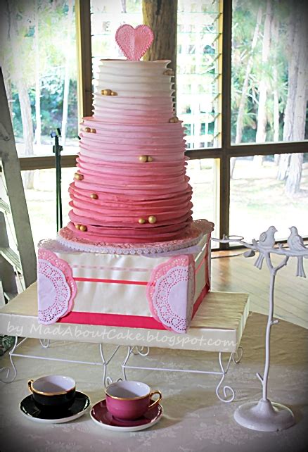Often associated with celebration, cakes are both a beautiful and tasty part of any wedding day! Mad About Cake: Pink Ruffle and Ombre Wedding cake