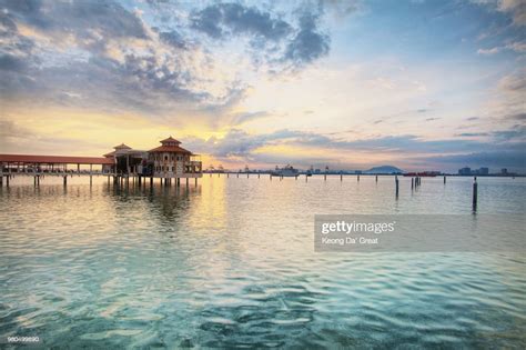Sunrise Over House On Strait Of Malacca Penang Malaysia High Res Stock