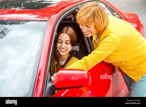 Teaching daughter drive car hi-res stock photography and images - Alamy