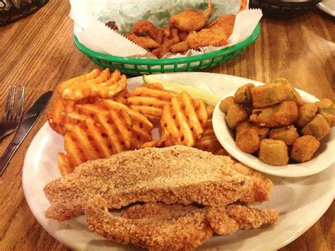 You will find fried catfish at the local fish fry, at that hidden fish shack, and even in a few skillets riverside after reeling one in. Grampa's. Catfish. 'Nuff said