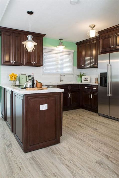 I am going to install dark colored wood flooring as the kitchen cabinets are all white. Dark Cherry Cabinets Wood Flooring in 2019 | Cherry wood ...