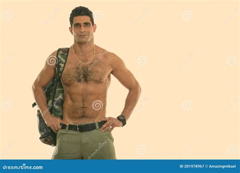 Studio Shot Of Young Muscular Persian Man Posing Shirtless Stock Image