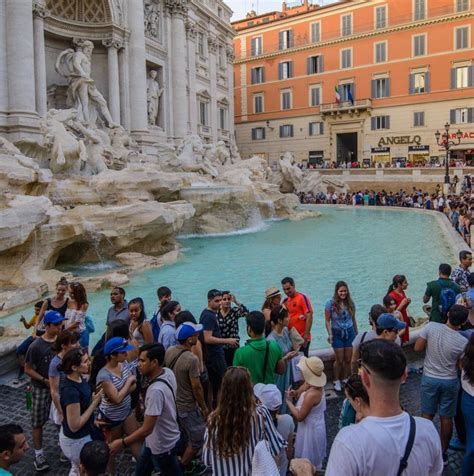 Trevi Fountain With Large Crowd Travel Off Path