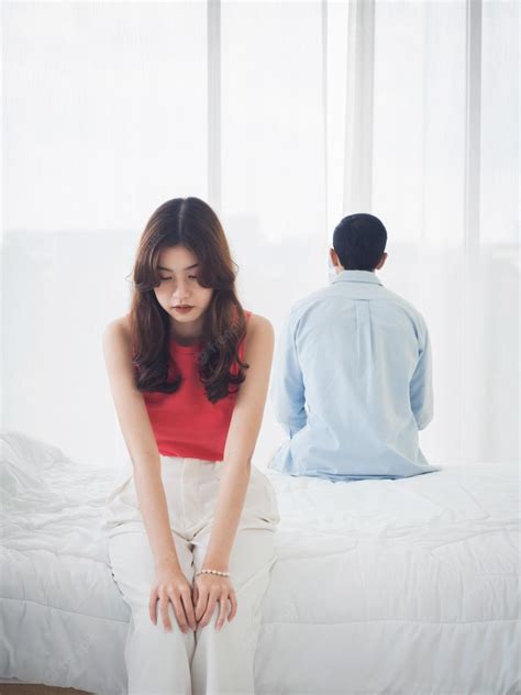 Premium Photo The Anxiety Of Asian Couple Lovers On The Bed Sad Young