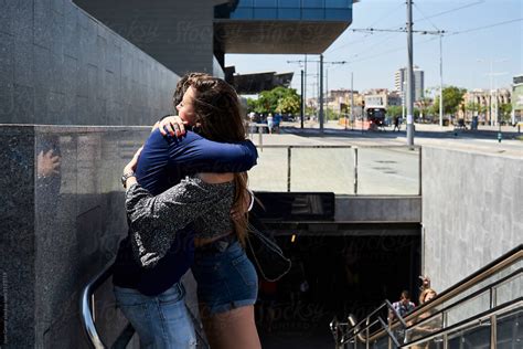 Couple Hugging To Say Goodbye Outside Metro Station By Ivan Gener Couple Hugging Hugging
