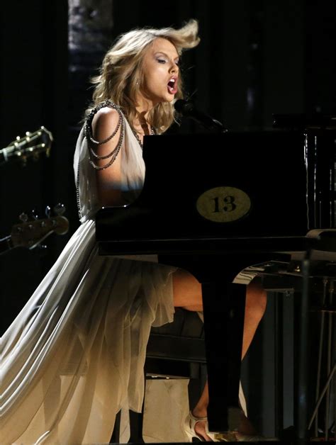 Taylor Swift Wears Gucci At 56th Annual Grammy Awards January 2014