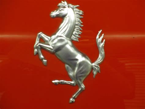Maybe you would like to learn more about one of these? Ferrari Horse Logo Silver