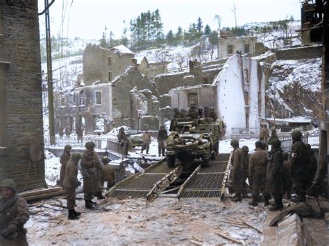 During The Battle Of The Bulge A Us Army Half Track Crosses A