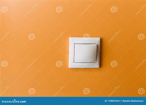 White Modern Light Switch On A Yellow Wall Stock Image Image Of