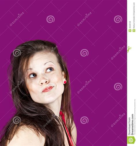 Portrait Of A Caucasian Beautiful Young Girl Looking Up Stock Photo