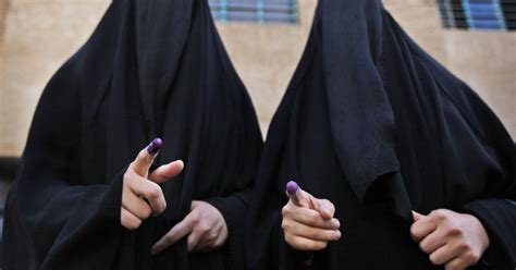 iraqis defy violence to vote