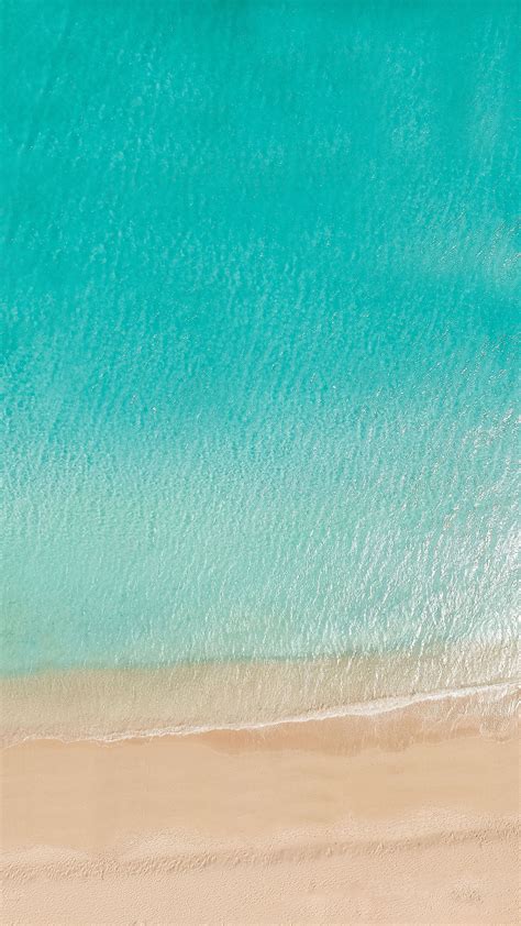Download Wallpaper 2160x3840 Ocean Aerial View Coast Sand Samsung