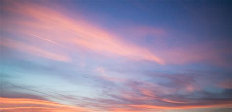 Beautiful Pastel Cloudy Sunset With Blue Sky In California Stock Photo