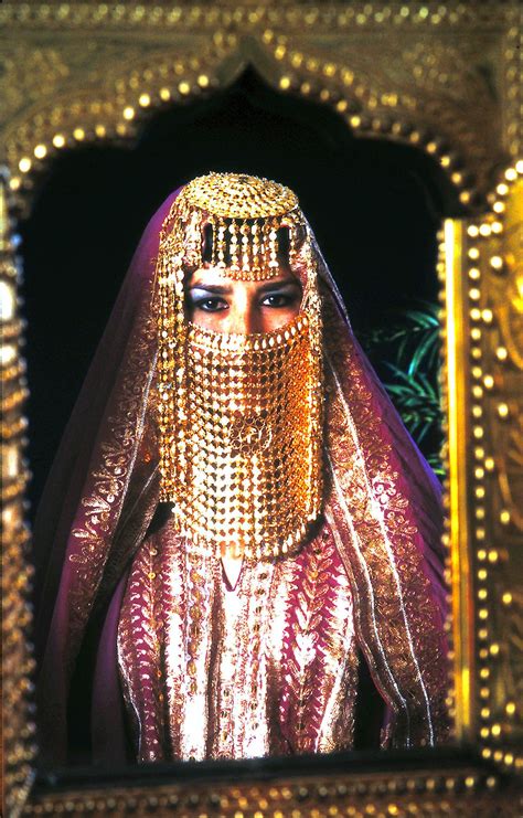 saudi arabia once the traditional bridal attire with saudi gold and first look in antique mirror