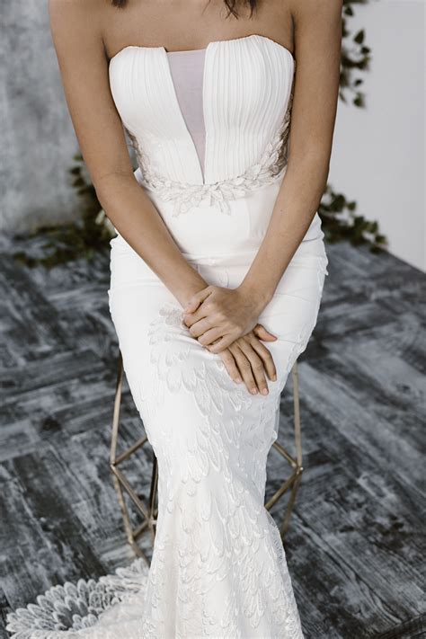For many, walking down the aisle feels more romantic and. Nike gown. Pleated bustier with embroidered skirt hemline ...