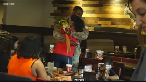 fourth of july homecoming military husband surprises wife during lunch break