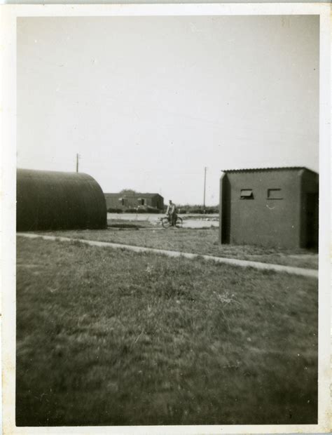 Serviceman On Bicycle Rides Through Airfield Thurleigh Airfield The
