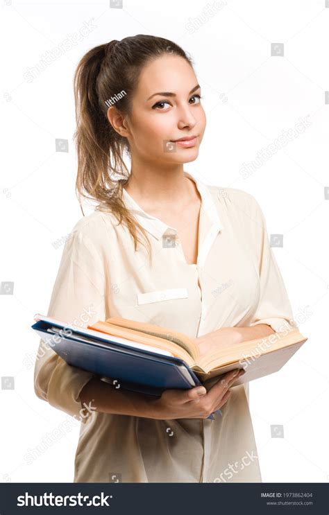 Gorgeous Young Student Girl Holding Books Stock Photo 1973862404