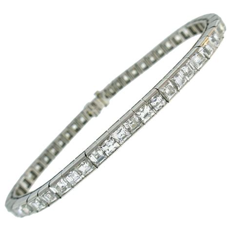 This exquisite piece features very high grade round brilliant cut diamonds, approx 7.0cts total weigh. Tiffany and Co. Diamond Platinum Tennis Line Bracelet ...