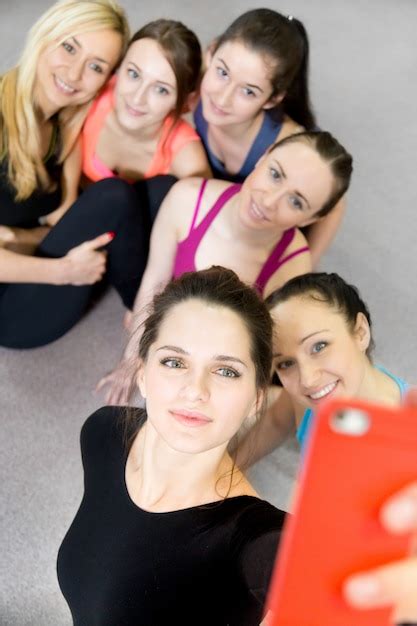 Free Photo Group Of Beautiful Sporty Girls Posing For Selfie Self