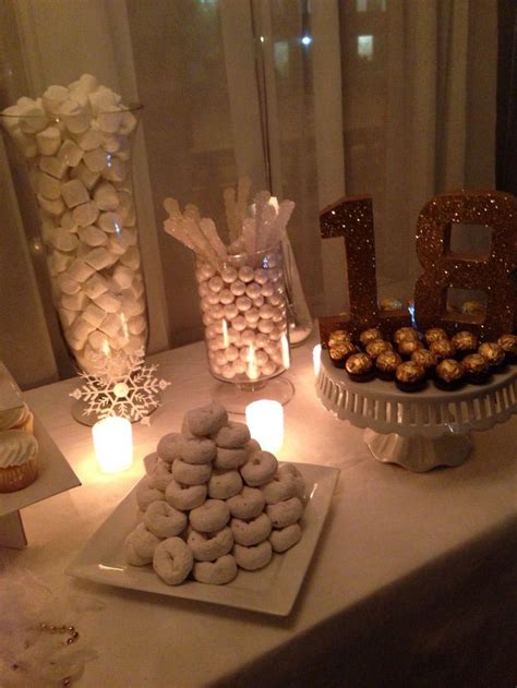 Bake a simple cake and use cat candle as cake toppers. 18th birthday giveaways ideas