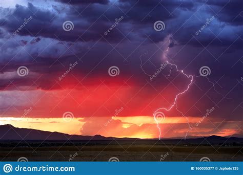 Stormy Sky With Lightning Strike At Sunset Stock Image - Image of ...