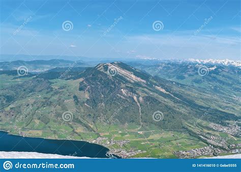 Beautiful Spring Panoramic View Of Snow Capped Mountains In The Swiss