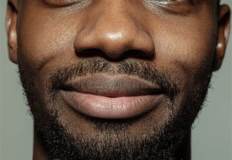 Close Up Of Face Of Beautiful African American Young Man Focus On