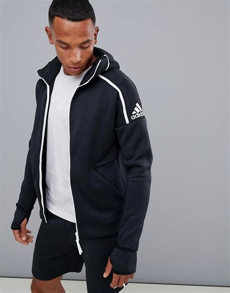 All styles and colours available in the official adidas online store. adidas - ZNE - Hoodie - Noir chiné DM5543 | ASOS