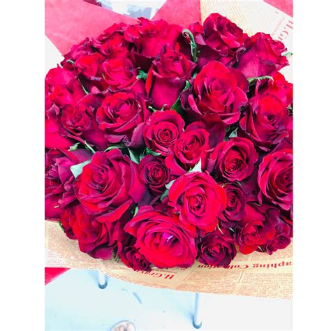 50 Red Roses In Wrapping Garden Gate Florist