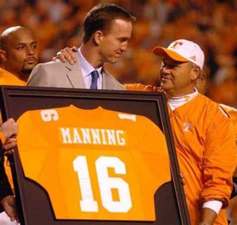 Former Ut Quarterback Peyton Manning Center Is Congratulated By Head