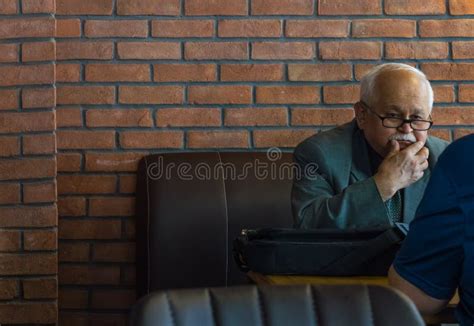 Eskisehir Turkey April 19 2017 Old Man With Eyeglasses Wearing Suit Sitting At A Cafe Table