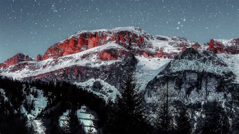 Download Wallpaper 1600x900 Mountains Starry Sky Peaks Snow Grass
