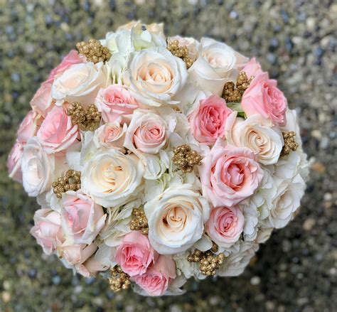 Gold Accents Add A Classical Touch To This Beautiful White And Rose