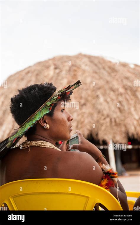 palmas brazil 27th oct 2015 an indigenous xerente brazilian sits in a yellow plastic chair