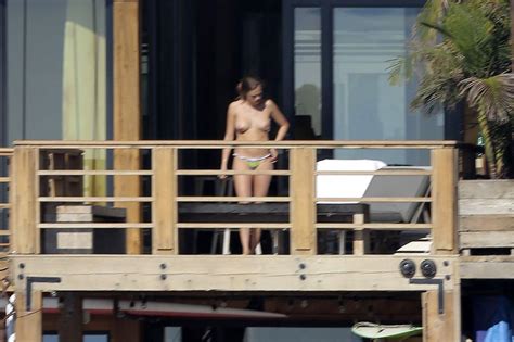 Cara Delevingne Topless On A Balcony In Malibu Scandal