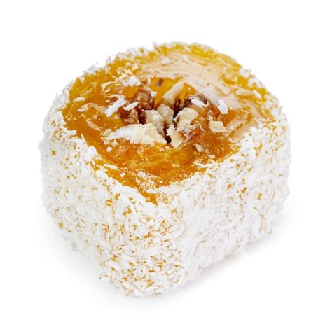 Premium Photo Yellow Turkish Delight With Nuts In Powdered Sugar