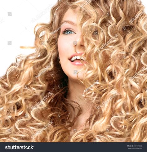 Beauty Girl With Blonde Curly Hair Healthy And Long