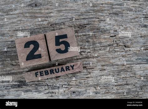 Cube Calendar For February On A Wooden Background With Copy Space Stock