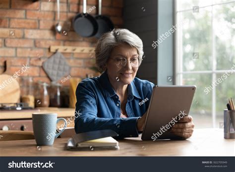 Happy Mature Greyhaired Woman Glasses Sit Stock Photo Shutterstock