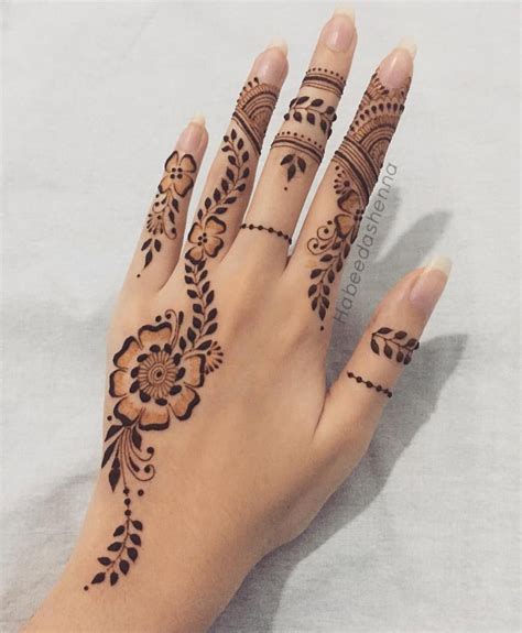 Image May Contain One Or More People And Closeup Henna Tattoo