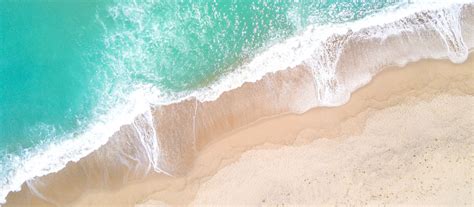 Aerial View Of Sandy Beach And Ocean With Waves Stock Photo Download