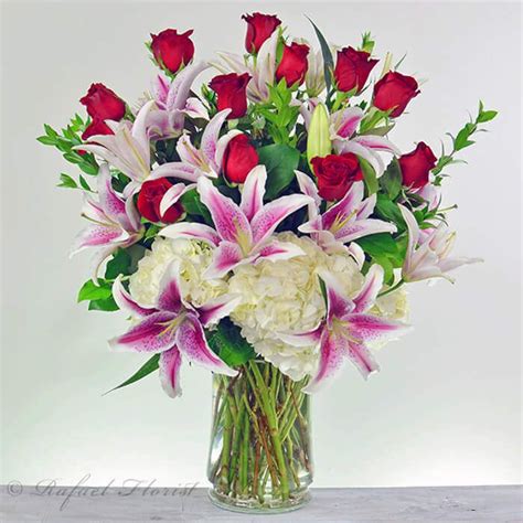 Romantic Floral Arrangement Of Premium Red Rose And Fragrant Lilies