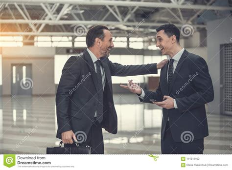 Outgoing Comrades Talking During Job Stock Photo Image Of