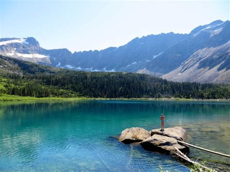 Nestled below a cirque of rocky peaks and a glacier, upper dewey lake is a breathtaking place for a picnic or an overnight hike. Upper Dewey Lake Skagway Alaska - Photorator